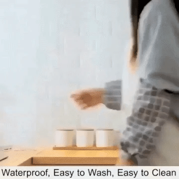 Person interacting with a surface with text 'Waterproof, Easy to Wash, Easy to Clean' at the bottom.